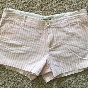 Light pink and white shorts with button detail